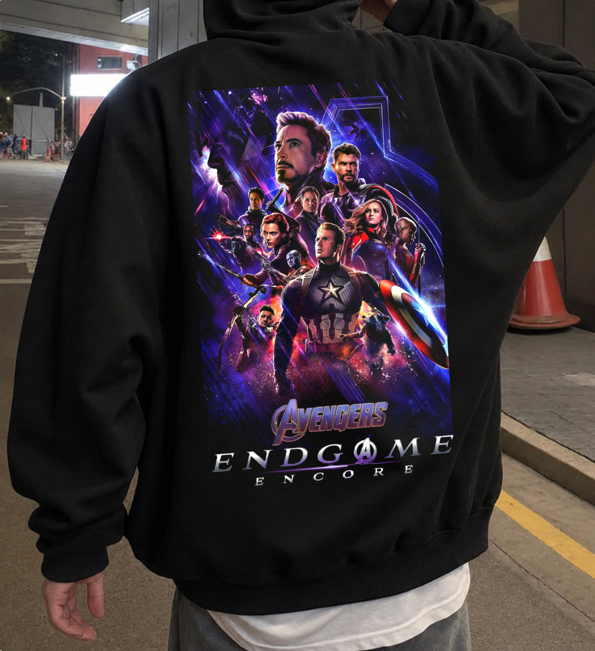 Black hoodie with a large colorful Avengers Endgame Encore graphic on the back, featuring multiple superhero characters against a purple and blue cosmic background.